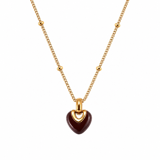 Collier Isméria doré pendentif cœur moderne romantique acier inoxydable fond blanc Amalys Paris