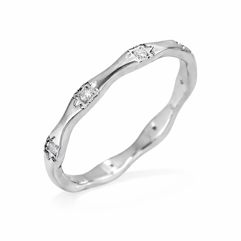Bague Luna argentée design ondulé courbes naturelles acier inoxydable fond blanc Amalys Paris